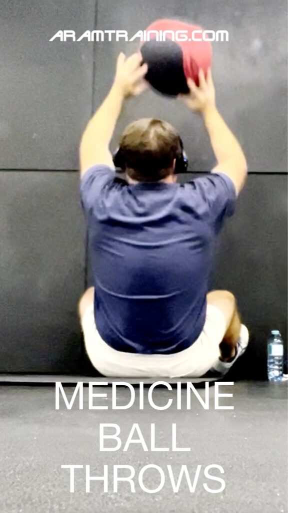 Medicine ball throws and twist throws specifically designed for maximum rowing core strength